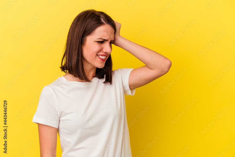 Young caucasian woman isolated on yellow background celebrating a victory, passion and enthusiasm, happy expression. Young caucasian woman isolated on yellow background celebrating a victory, passion and enthusiasm, happy expression.