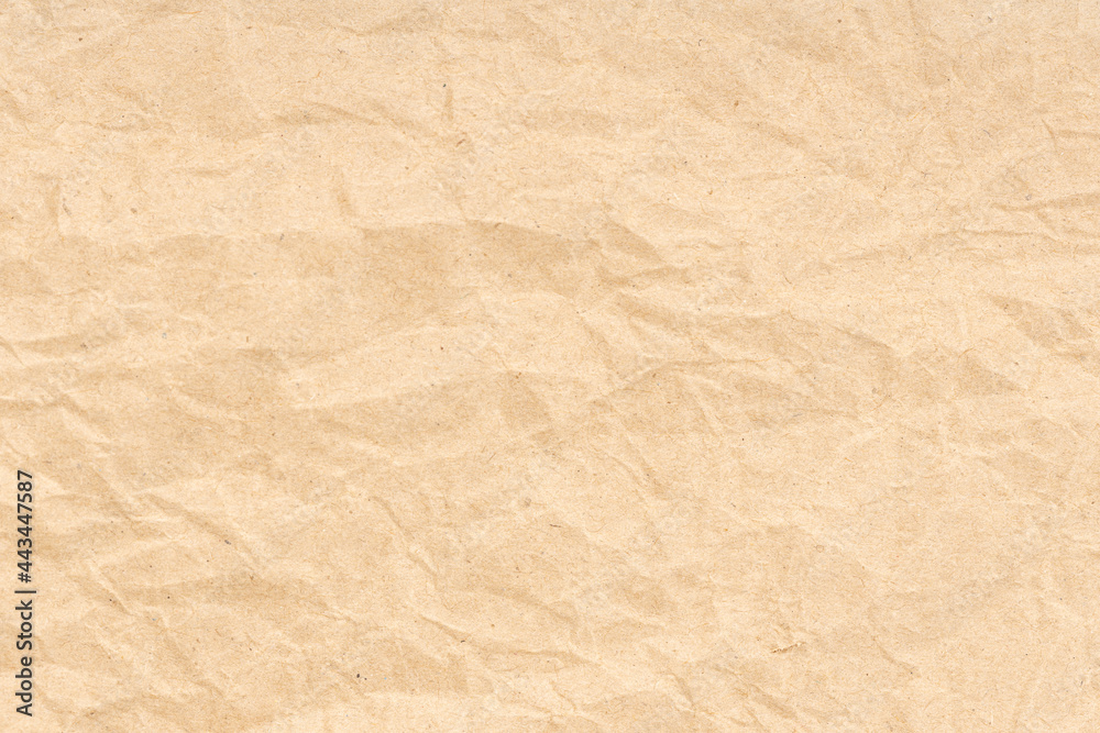 Crumpled paper texture background. Light brown color Crumpled paper texture background. Light brown color