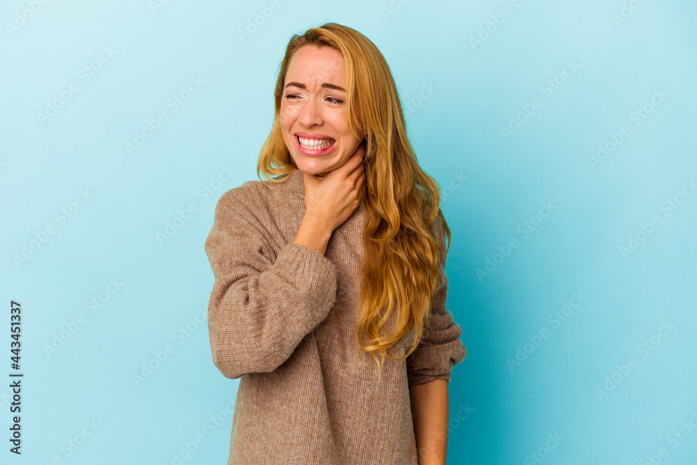 Caucasian woman isolated on blue background touching back of head, thinking and making a choice. Caucasian woman isolated on blue background touching back of head, thinking and making a choice.