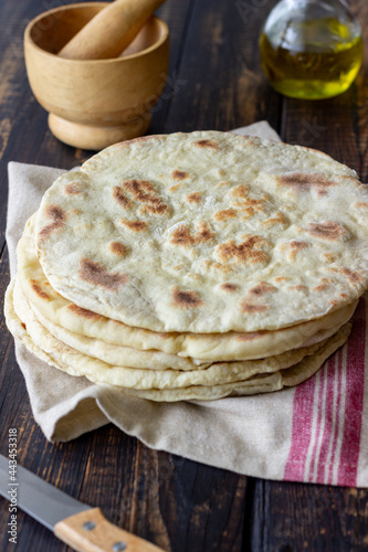 Pita bread on a wooden background. National cuisine. Healthy eating. Vegetarian food.