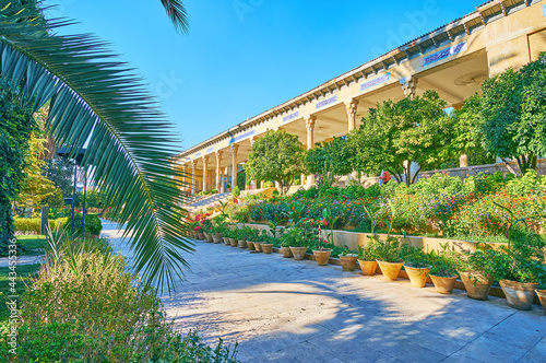 Mussala Gardens' entrance through the palm branch, Shiraz, Iran photo