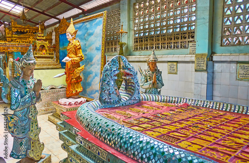 The Nats sculptures at Buddha Footprint, Ngar Htat Gyi Buddha Temple, Yangon, Myanmar photo