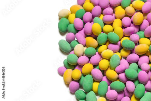 Group of colorful peanuts in glaze.