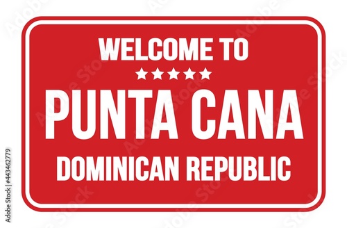 WELCOME TO PUNTA CANA - DOMINICAN REPUBLIC  words written on red street sign stamp