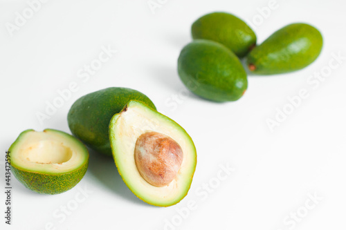 Group of avocado whole and half on white background. Natural concept.
