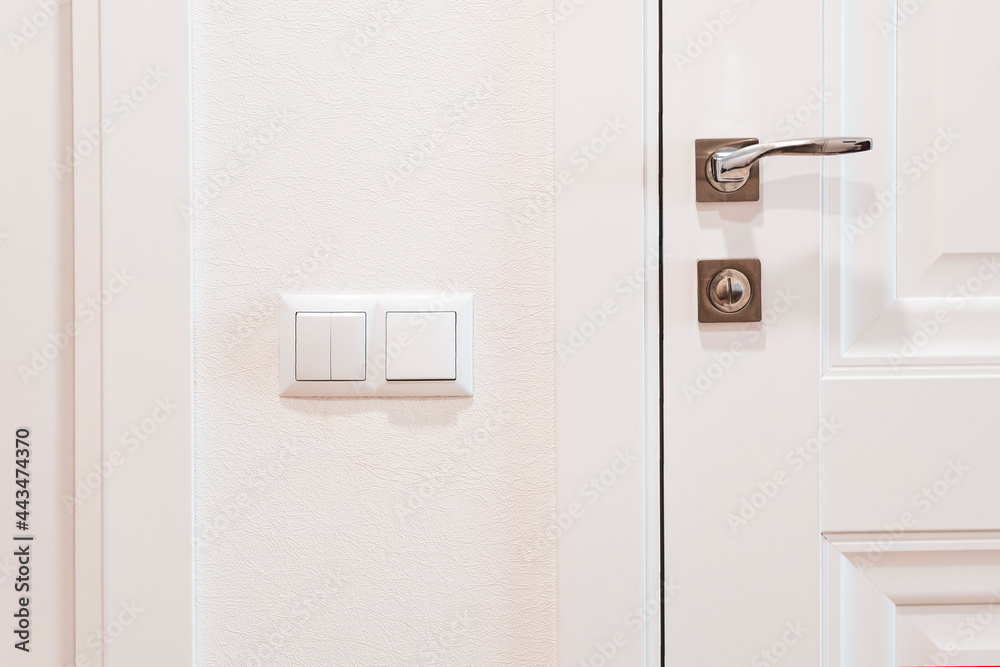 White doors. Two switches