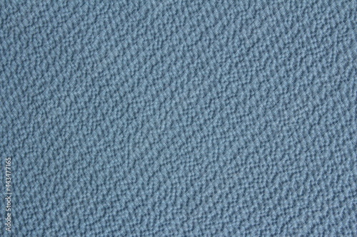 Texture of pale blue relief fabric