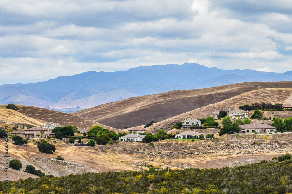 Urban sprawl: Luxury housing springs up in otherwise pristine hillsides in central California.