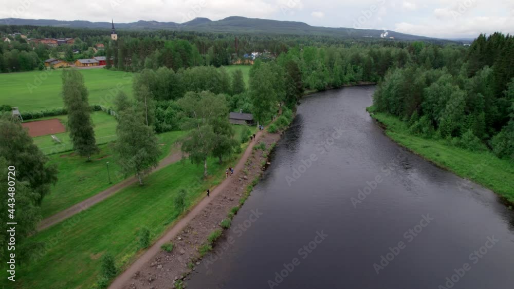 Runners Run Along Along River, Fitness Concept, Pull Back Aerial Runners Run Along Along River, Fitness Concept, Pull Back Aerial