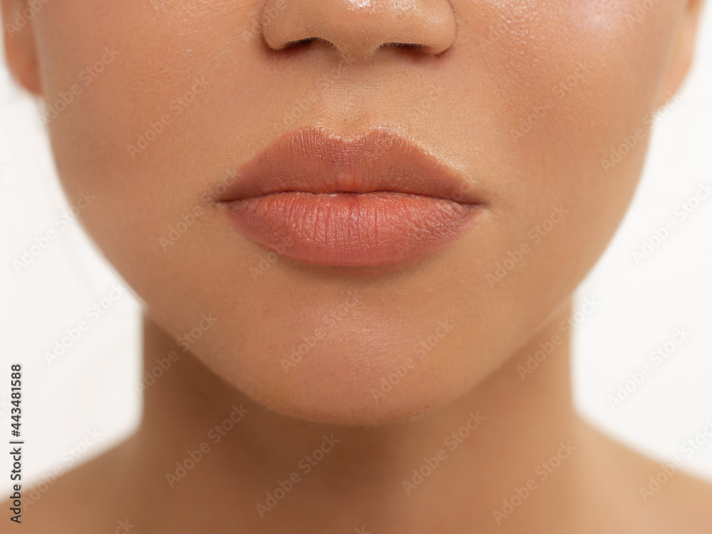 Obraz premium Perfect Lips. Sexy Girl Mouth close up. Beauty young woman Smile. Natural plump full Lip. Lips augmentation. Close up detail. Natural beauty