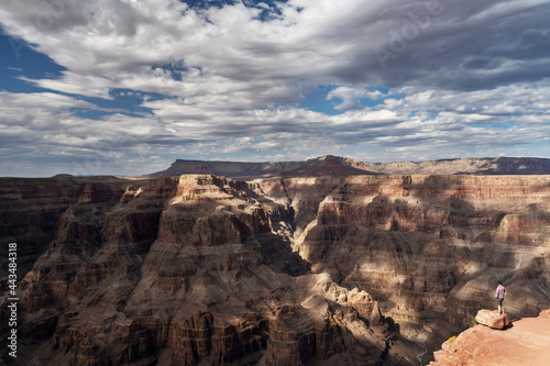 The natural walls of the Grand Canyon againts a Cloudy backdrop