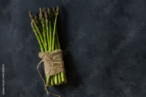 bunch of asparagus on the dark background 