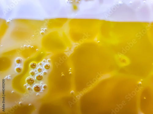 A Refreshing Soft Drink. Mojito Is Poured Into A Glass Close-Up. Lemon