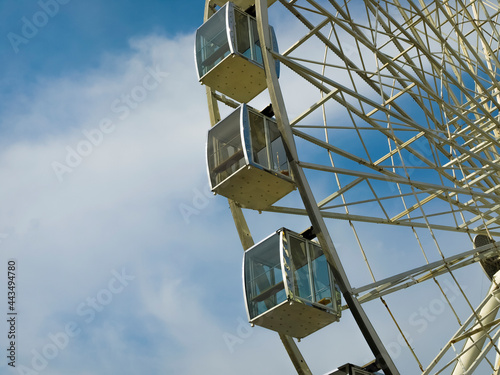 Ferris wheel cabins against the sky