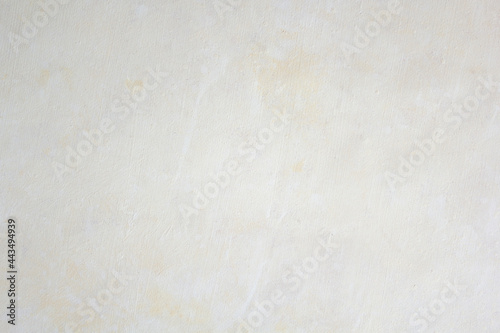 OLD GRUNGE Beige TEXTURE BACKGROUND, VINTAGE GRAINY WALLPAPER WITH COPY SPACE AND SPACE FOR TEXT
