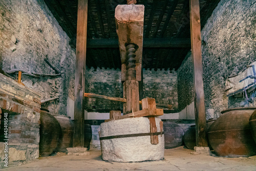 Old traditional wine press in mountain village Omodos on Cyprus