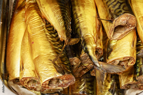 Smoked golden herring. Abstract culinary background selective focus photo