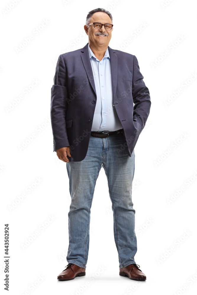 Full length portrait of a mature man wearing jeans and suit Full length portrait of a mature man wearing jeans and suit