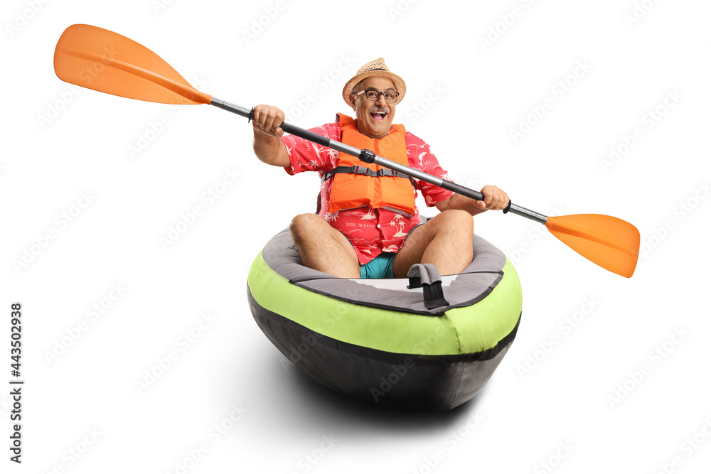Mature man paddling in a kayak - obrazy, fototapety, plakaty 
