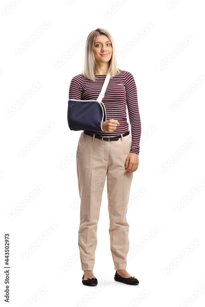 Full length portrait of a young woman with a broken arm wearing an arm splint Full length portrait of a young woman with a broken arm wearing an arm splint