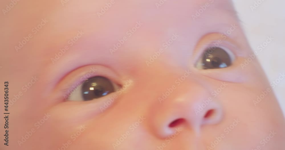 curious surprised look of a little cute baby.close-up. curious surprised look of a little cute baby.close-up.