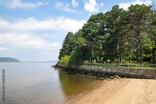 Sleepy Hollow, NY - USA - July 5, 2021: a horizontal view of scenic Kingsland Point County Park, an 18-acre park located on the eastern shore of the Hudson River in the Village of Sleepy Hollow. photo
