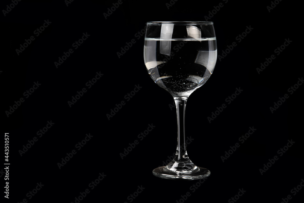 TRANSPARENT CRYSTAL BOWL ISOLATED ON BLACK BACKGROUND TRANSPARENT CRYSTAL BOWL ISOLATED ON BLACK BACKGROUND
