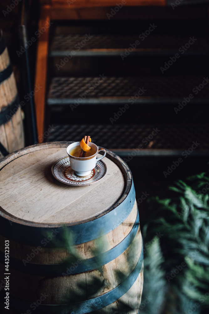 hot toddy on bourbon whiskey barrel rustic autumn chilly evening 