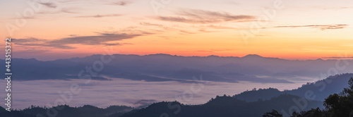 View of foggy morning sky above misty forest. winter season in Thailand. Panorama, Panoramic Shot.