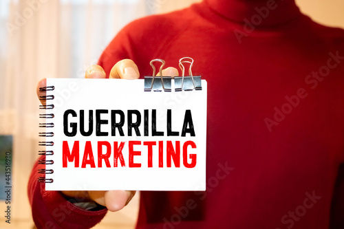 Fotografía Text sign showing guerilla marketing