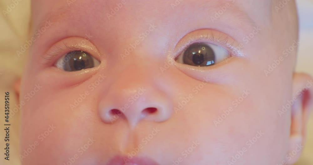 surprised look ridiculously cute little baby.baby face close up.