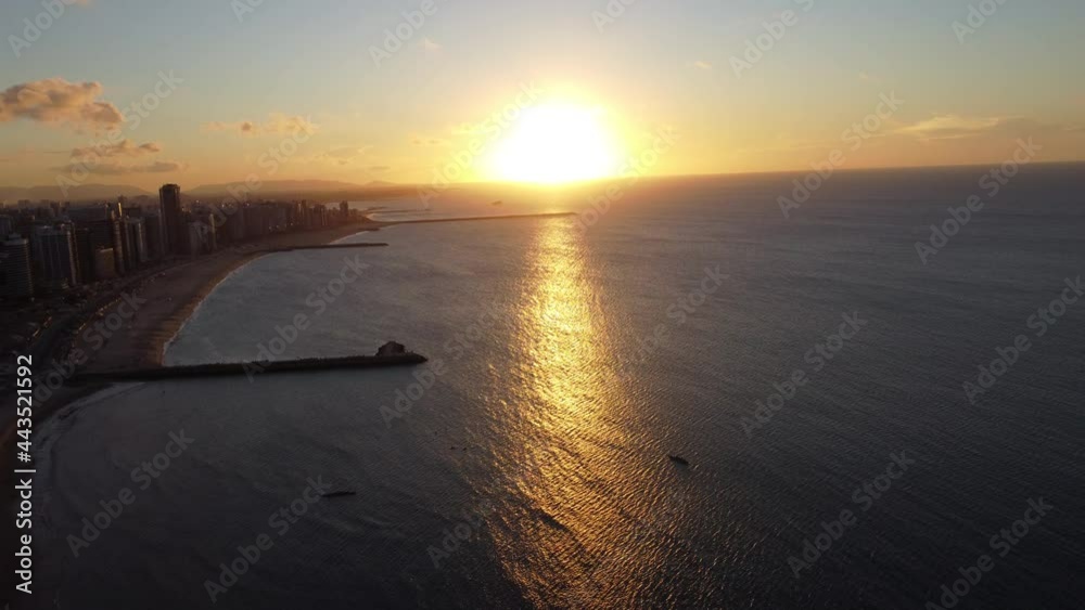 Bay scene of sunset on the beach in Fortaleza city, Ceara, Brazil.Bay scene of sunset on the beach in Fortaleza city, Ceara, Brazil.Bay scene of sunset on the beach in Fortaleza city, Ceara, Brazil.
