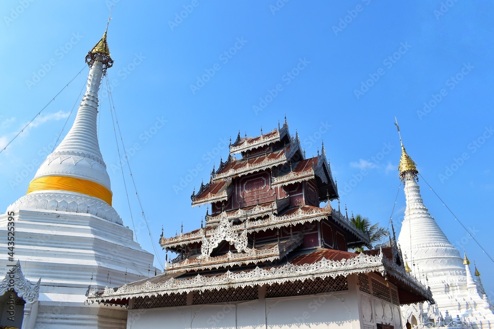 Two white pagodas and Lanna art churches in the Phra that Doi kong mu temple, Maehongson, THAILAND.