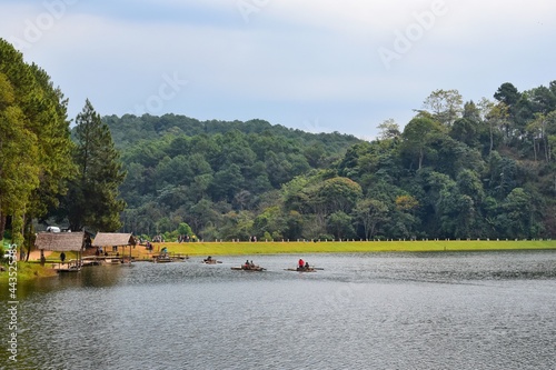 Mae Hong Son, THAILAND - 29 December 2018 : Tourists prefer to rent bamboo rafts for views of the lake and forest at Pang Ung in Mae Hong Son, THAILAND.