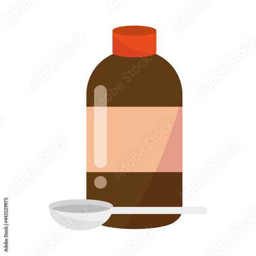 medical syrup bottle and spoon
