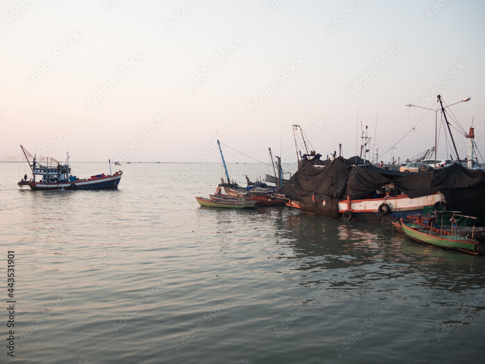 Sunset time at fisherman port in Thailand.