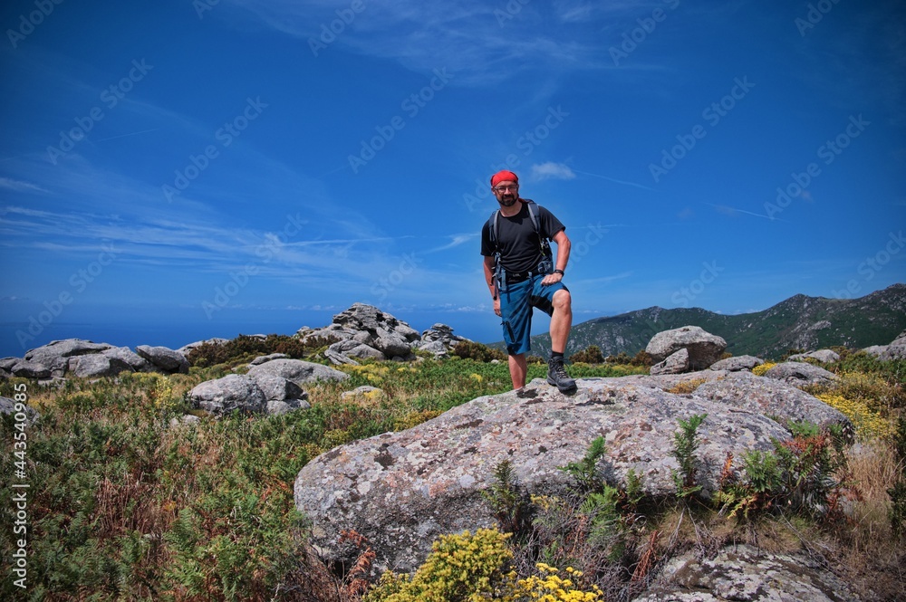 Mature man with beard during a hike in mountains