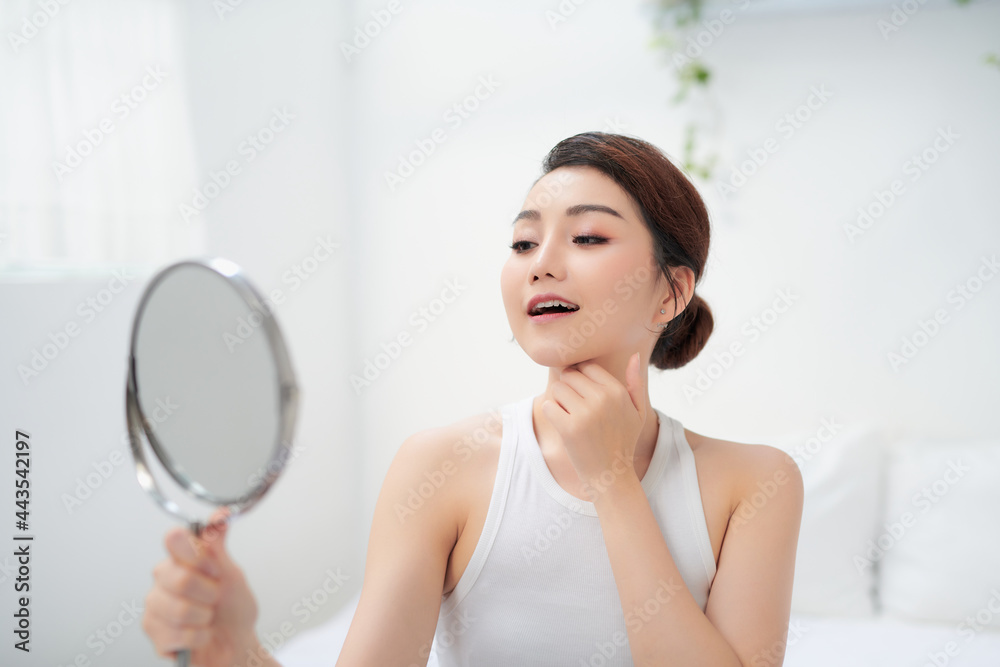 Beautiful face of young adult woman with clean fresh skin Beautiful face of young adult woman with clean fresh skin