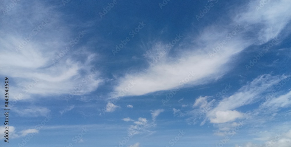 white clouds in the morning sky