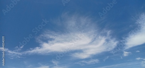 white clouds in the morning sky