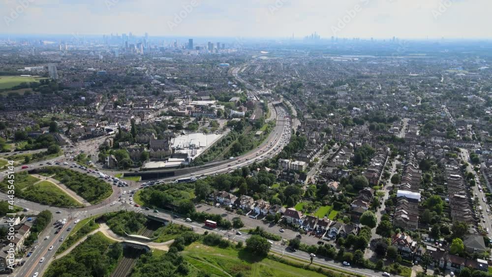 Leyton and Leytonstone East London Waltham forest London skyline in background rising drone footage 4K Leyton and Leytonstone East London Waltham forest London skyline in background rising drone footage 4K