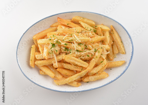 deep fried golden French fries with parmesan cheesy sauce in white background western snack cuisine halal fast food menu
