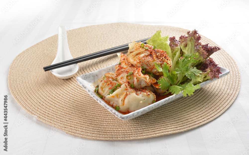 double boiled meat dumpling with spicy mala chilli sauce in white background asian halal menu double boiled meat dumpling with spicy mala chilli sauce in white background asian halal menu