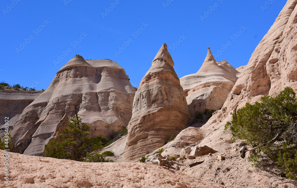 the bizarrely eroded  volcanic ash rock formations of kasha-katuwe tent rocks national monument on a sunny day , near santa fe, new mexico
