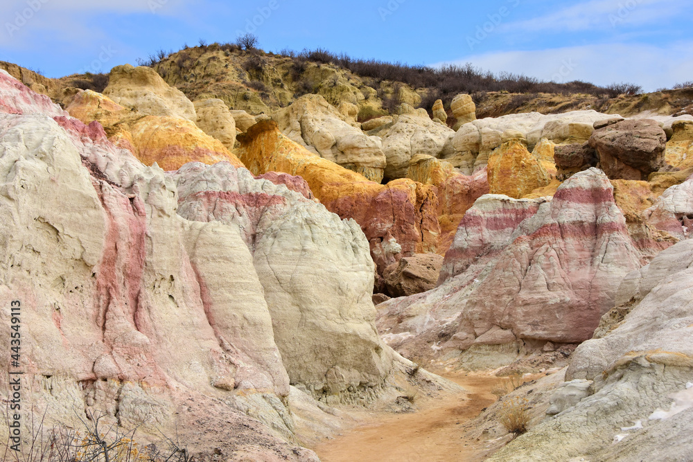 the fantastically-colored and eroded yellow, pink, and white hoodoos of paint mine, on a sunny day near calhan, el paso county, colorado the fantastically-colored and eroded yellow, pink, and white hoodoos of paint mine, on a sunny day near calhan, el paso county, colorado