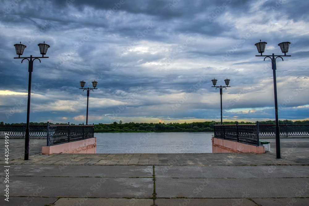 Evening clouds over the Oka river embankment in Murom