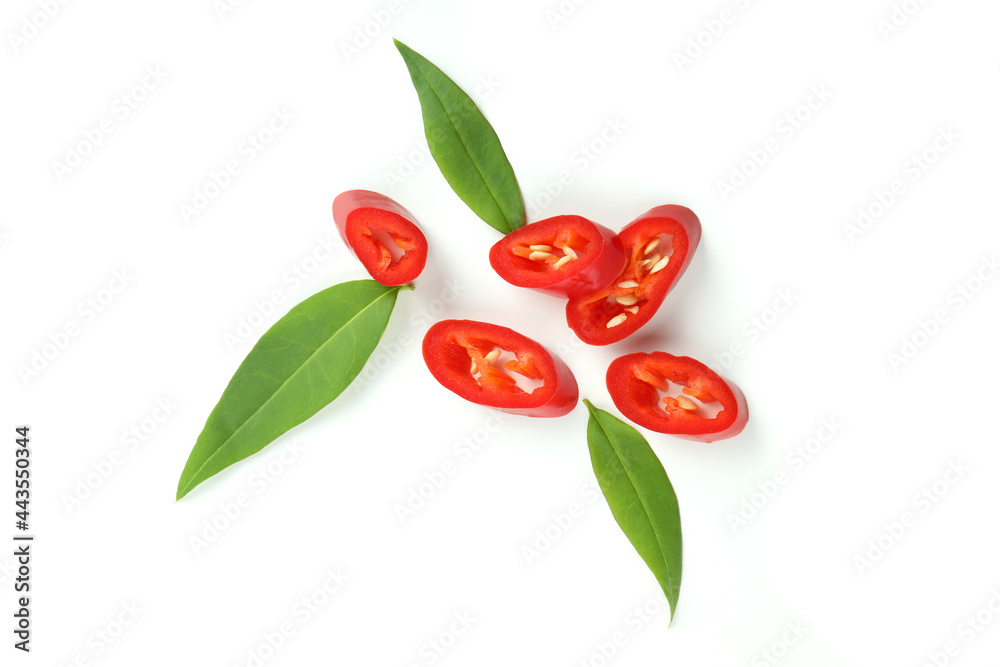 © Atlas - Red hot chili pepper slices isolated on white background