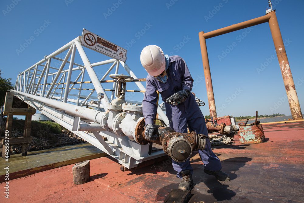 Male worker inspection and measurement thickness pipeline oil