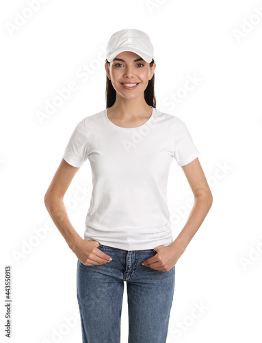 Canvas Print Young happy woman in cap and tshirt on white background