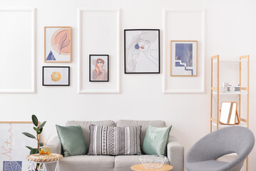 Interior of stylish living room with pictures